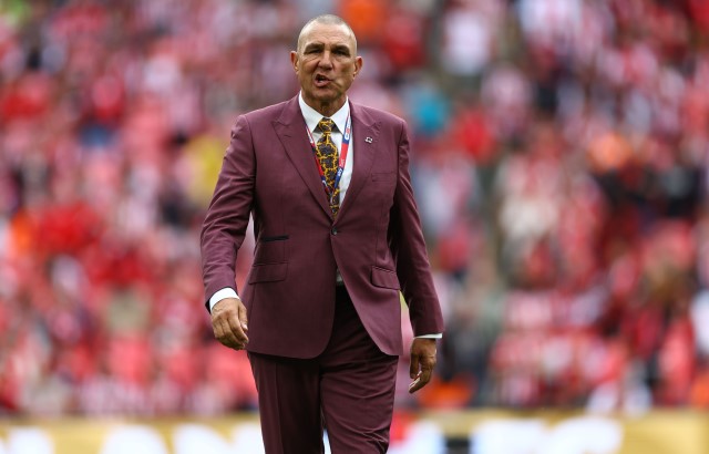 Vinnie Jones walking onto the pitch at Wembley ahead of a live CPR demonstration
